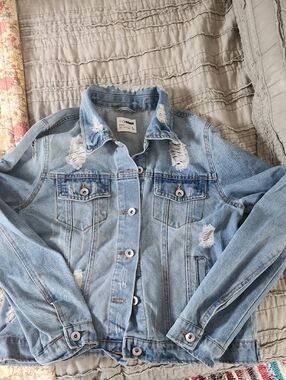 Distressed jean jacket